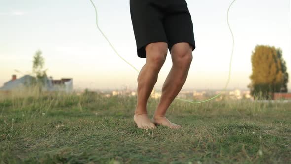 Image of Healthy Man Stretching His Body at Sports Ground Outdoors