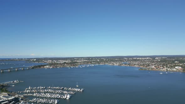 Stunning aerial view of blue ocean and boats marina in Sydney Harbour