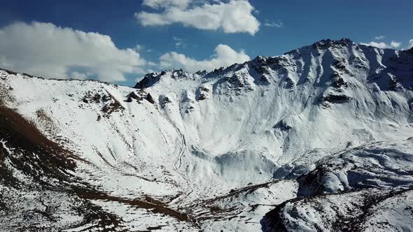 Snowcapped Mountains and a Lake