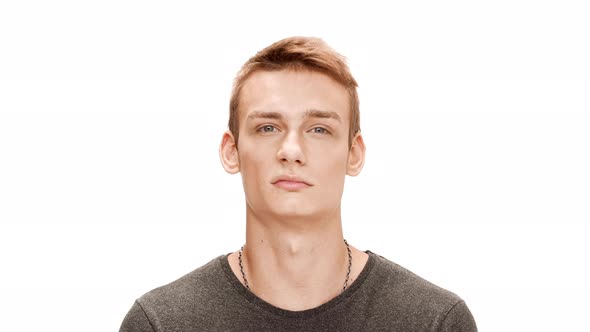 Nervous Angry Young Handsome Man Over White Background