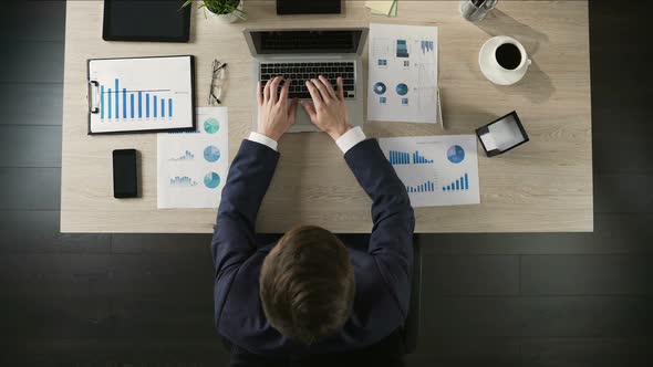 Office Worker Opening Laptop and Working on Project, Businessman Top View