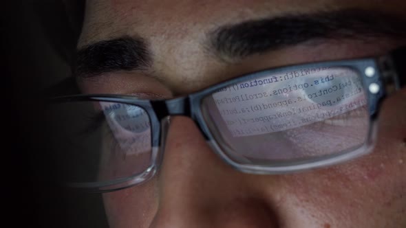 Young Brunette Man Eyes Closeup Computer Screen Reflection in Glasses