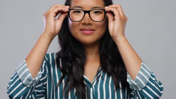 Happy Asian Woman in Glasses or Student