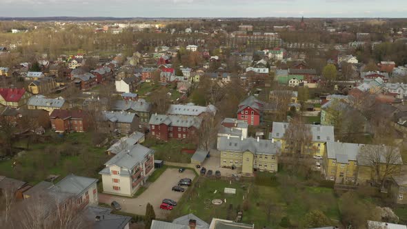 Drone shot of colorful wooded houses in Supilinn district