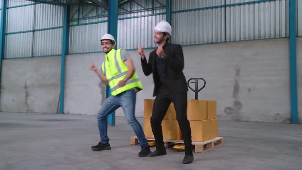 Funny Factory Workers Dance in the Factory