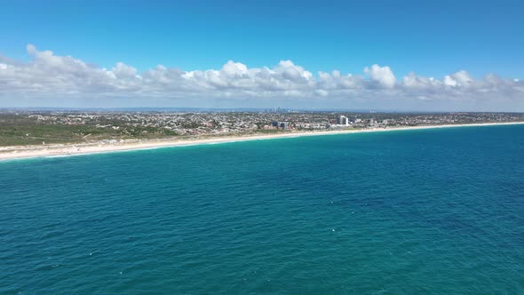 4k Drone Trigg Island Beach with Perth City in the Background