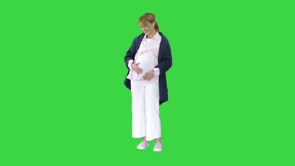 Pregnant Woman Caressing Her Belly Green Screen Chroma Key