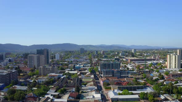 Drone Shot travel left, city ​​of talca maule septima region Chile looking at the buildings in the c