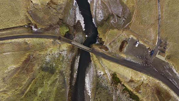 Drone Over Bridge Crossing Fjaora River In Fjaorargljufur Canyon