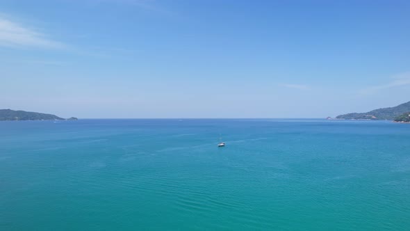 Aerial view beautiful sea beach in summer day. Phuket Thailand Amazing sea with travel boats