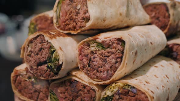 Closeup of Kebab with Fresh Vegetables and Chicken Pork Beef on Street Shop Market Close Up