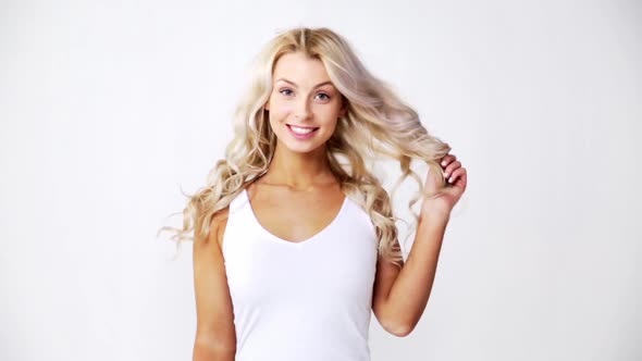 Happy Smiling Beautiful Young Woman in White Top