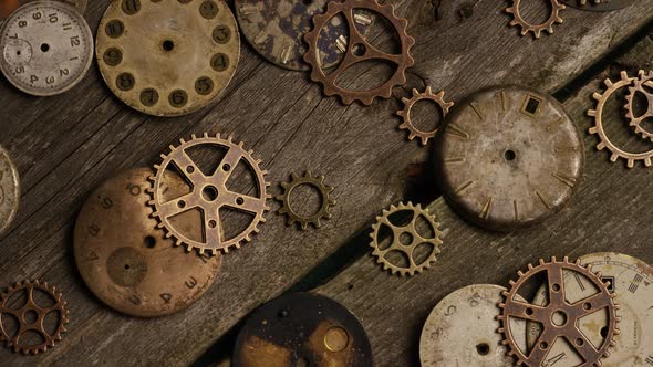 Rotating stock footage shot of antique and weathered watch faces - WATCH FACES 076