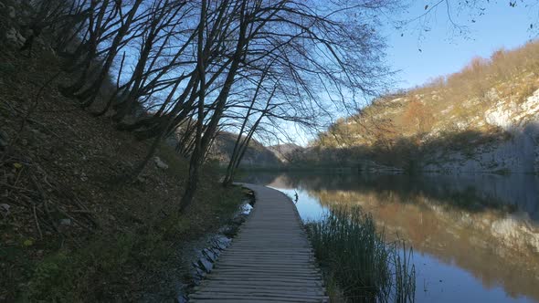 Timber boardwalk along a lake at Plitvice Park