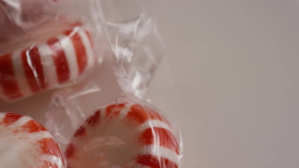 Rotating shot of peppermint candies - CANDY PEPPERMINT 012