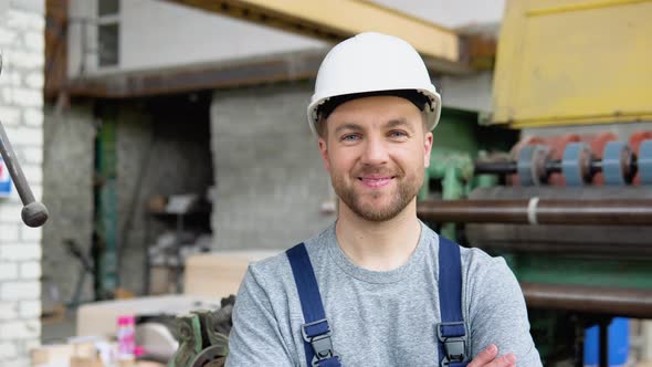 Portrait of a Professional Worker in an Industrial Workshop