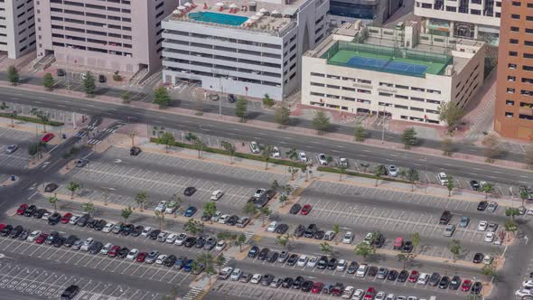 Big Parking Lot Near Mall Crowded By Many Cars Timelapse Aerial View