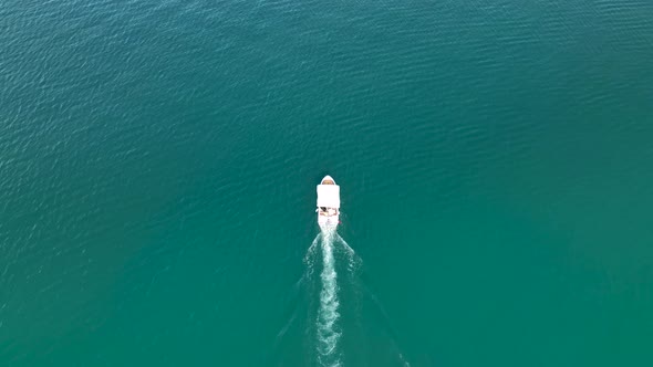 Fishing boat goeas to sea aerial view Turkey Alanya 4 K