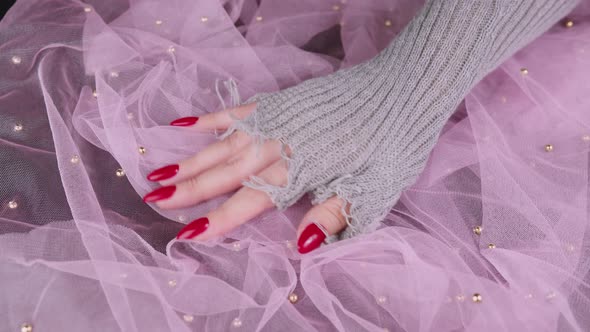 Woman's Hand with Red Nails