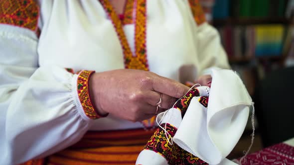 Woman Hands Doing Crossstitch