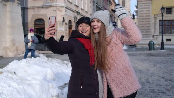 Two Young Smiling Women Tourists Bloggers Taking Selfie Photos Portrait Video Conferencing Call