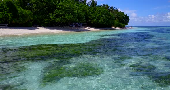 Beautiful fly over tourism shot of a summer white paradise sand beach and turquoise sea background i