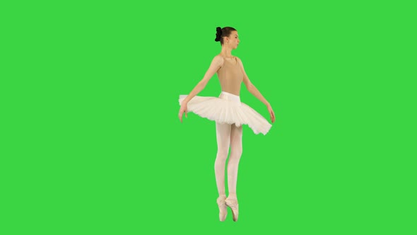 Young Ballerina Walks En Pointe on a Green Screen Chroma Key