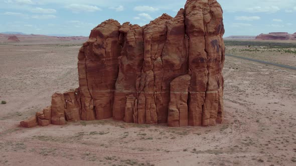 Eroded Rock Formation Cliff by Road in Southwest Desert of Arizona, Aerial