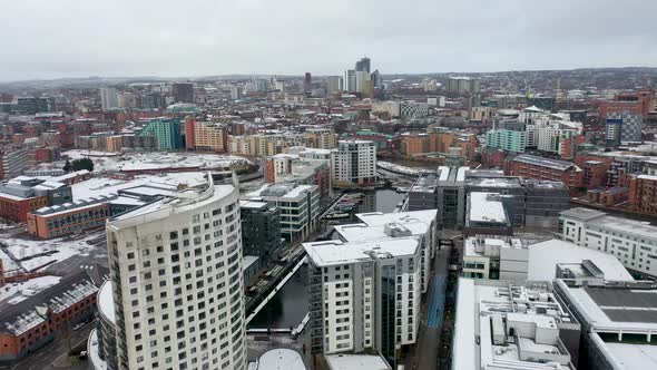 Aerial footage of a snowy winters day in the city of Leeds