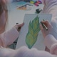 Female Designer Designer Drawing Picture in a Sketchbook - VideoHive Item for Sale