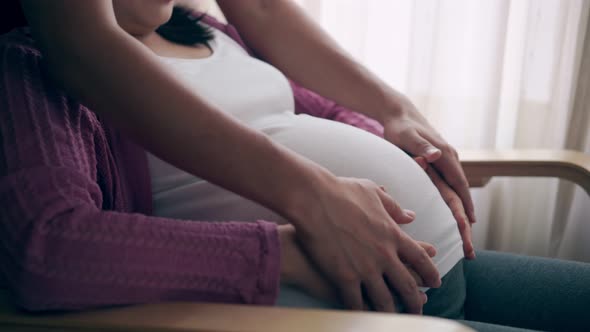 Pregnant Couple Feels Love and Relax at Home