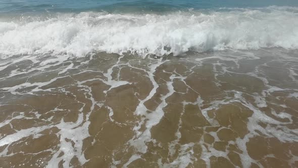 Slow Motion Footage of Sea Waves Breaking on Shore