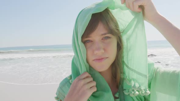 Young woman by the sea