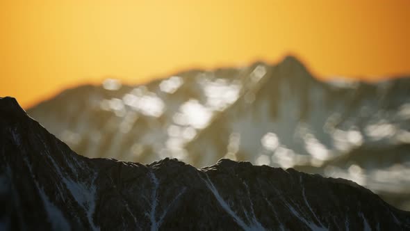 Winter Landscape in Mountains at Sunset