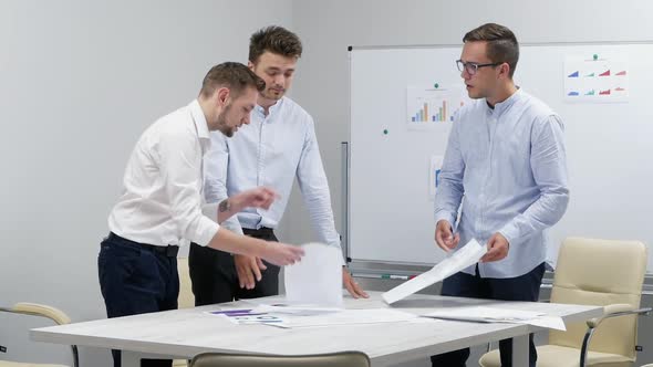 Angry Boss Shouts at Workers Throwing Documents in Slow Motion, Failed Project, a Quarrel in a Team