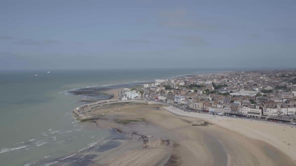 Pull out reveal, Margate beach in Kent England. Smooth aerial drone footage