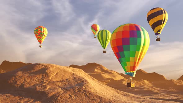 Colorful ho air balloons flying above desert mountain landscape during the day.