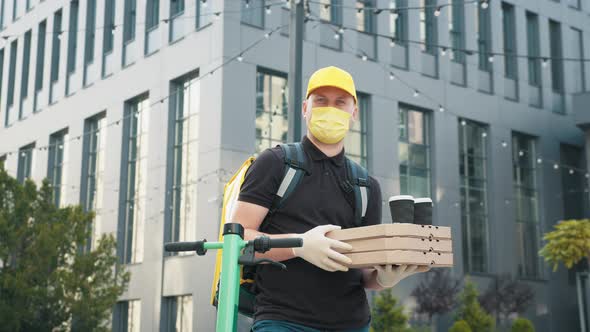 Portrait Shot of Handsome Caucasian Delivery Man in Gloves and Medical Mask