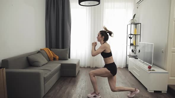 Young Woman Doing Fitness Workout for Healthy Lifestyle at Home