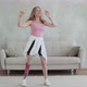 Beautiful disabled woman in good mood dancing in bright room during day. - VideoHive Item for Sale