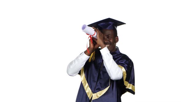 Man with Graduation Gown and Diplom