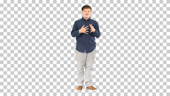 Young boy telling a story to camera, Alpha Channel