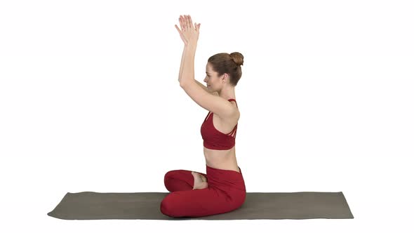 Young Sporty Attractive Woman Practicing Yoga, Doing Lotus Pose on White Background.