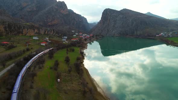 Train Travelling Through Town