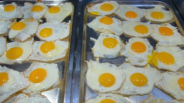 A lot of roasting eggs at self service restaurant.