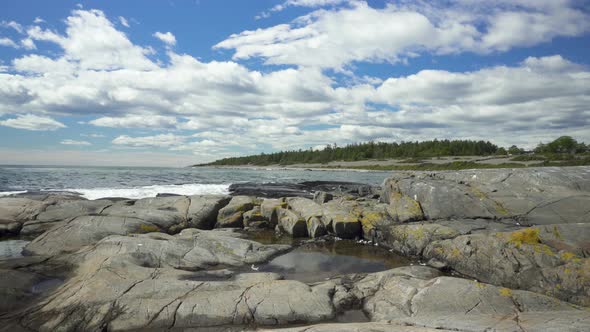 Jomfruland rocky coastline, Norwegian island, slider shot