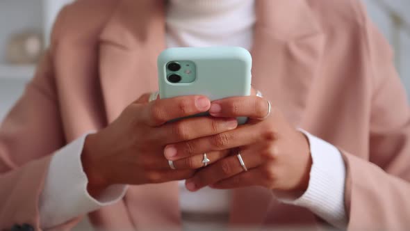 White Mobile Phone in Hands African American Woman Typing SMS in Messenger