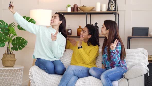 Female bloggers recording video for social media at home