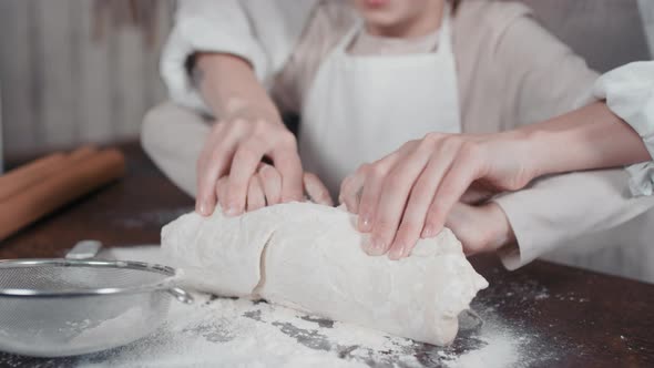 Kneading Bread Dough Together