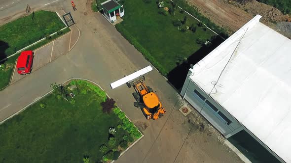 Construction site outdoor. Aerial shooting of construction site in suburb area